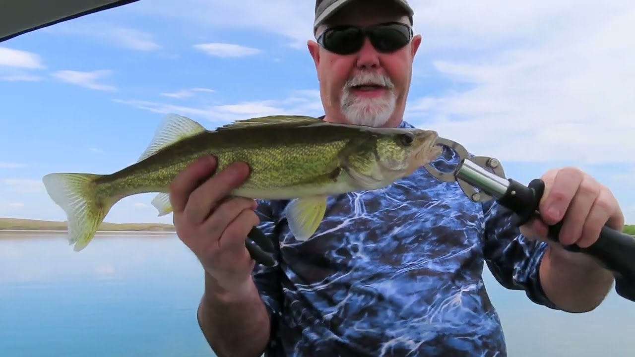 Fishing boat scene from McGregor Lake Walleye Splash