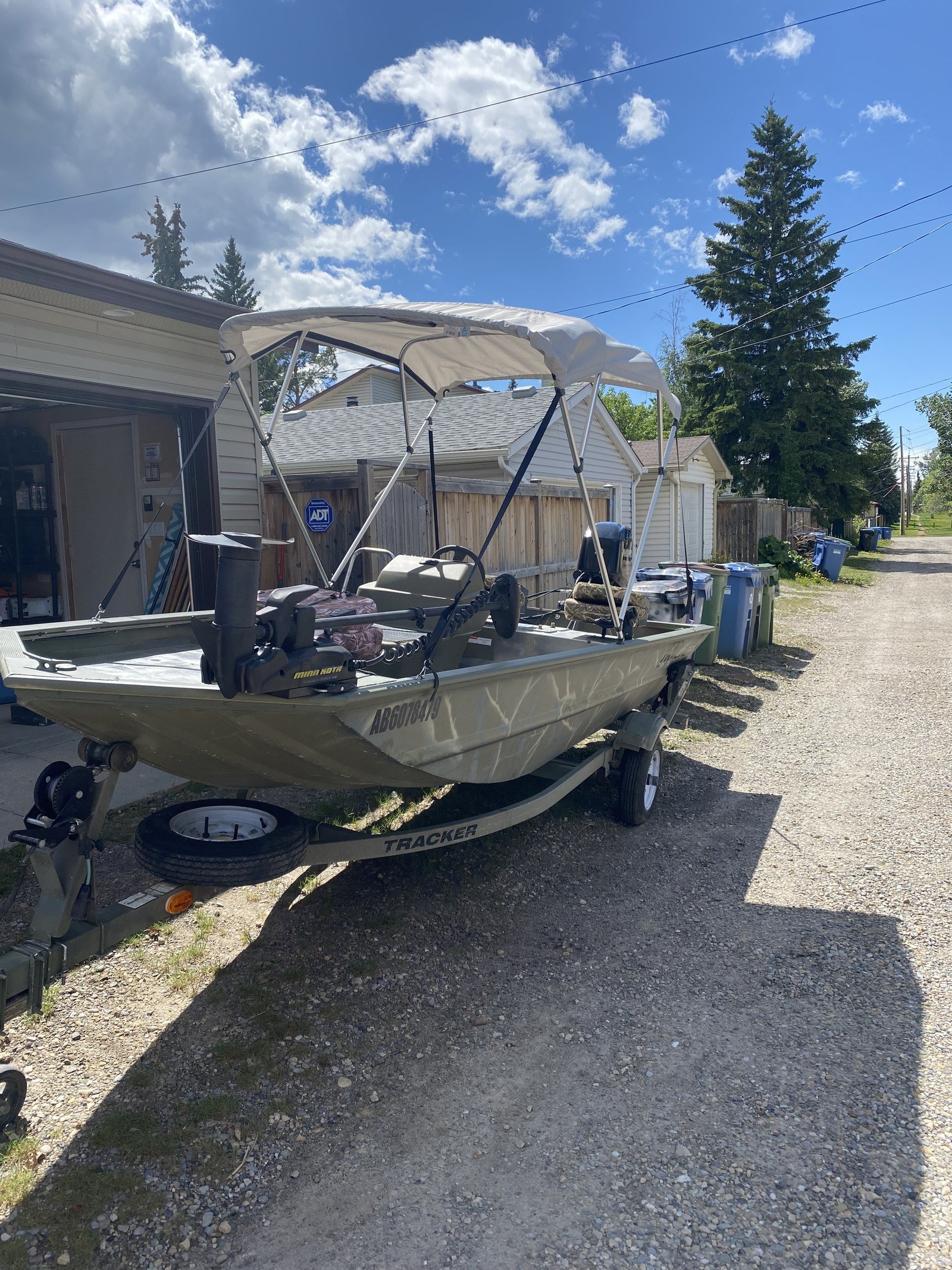 New Raw Footage Adventures Tracker boat on trailer with canopy